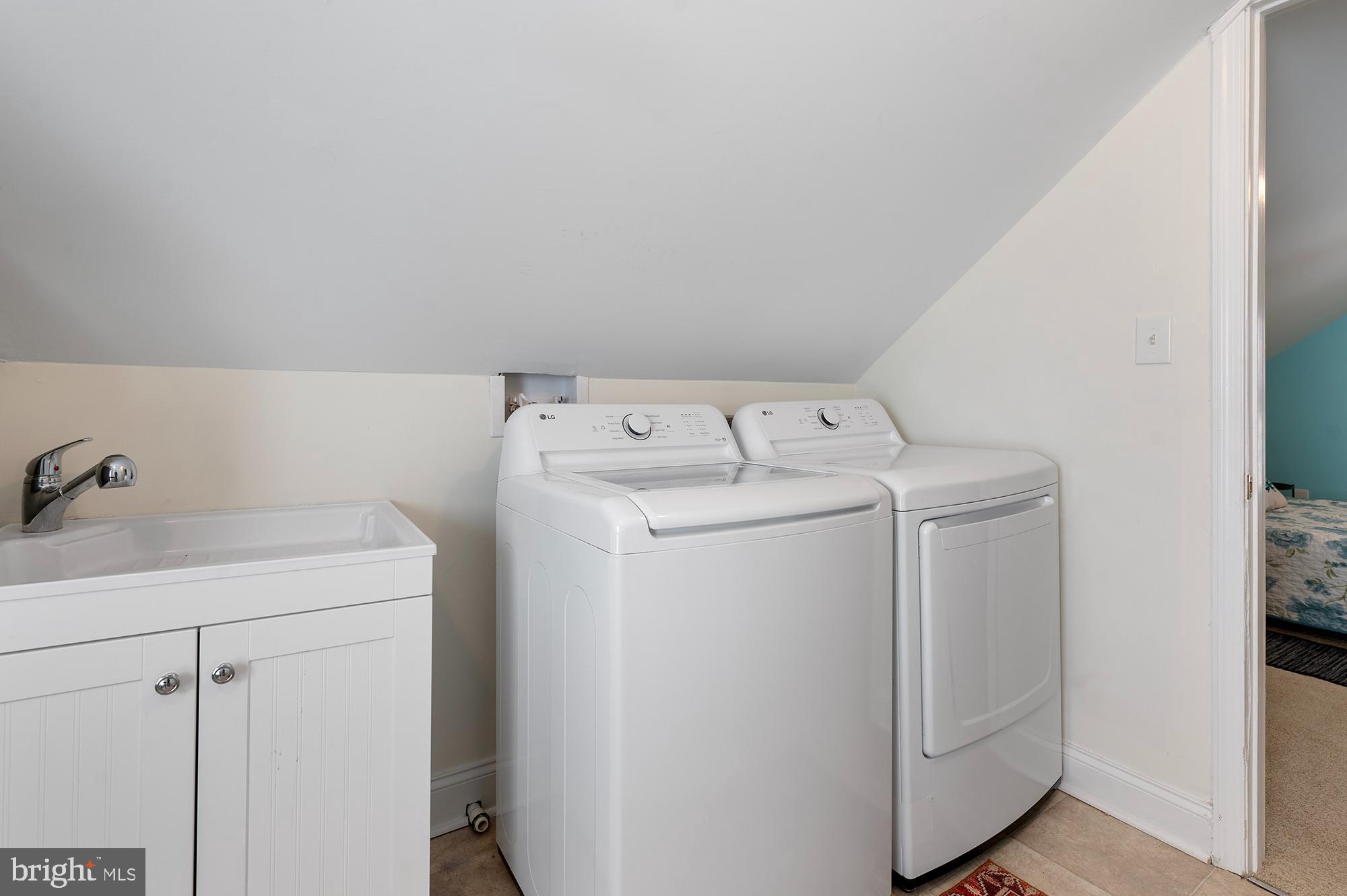 104 Wilson Boulevard Southwest Glen Burnie, MD 21061 - Photo 16 of 23 a utility room with dryer and washer