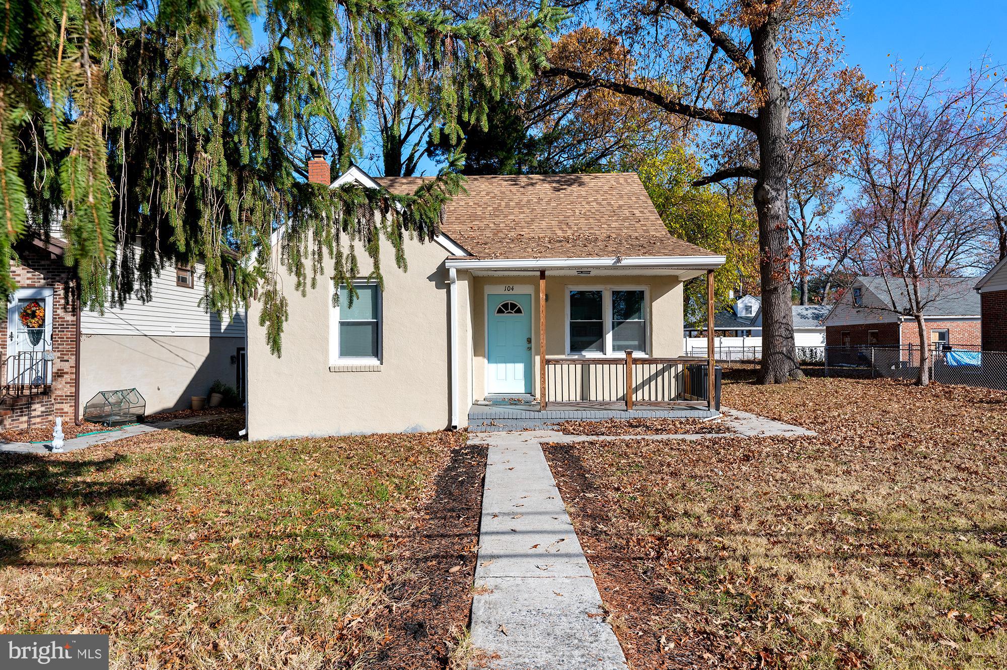 104 Wilson Boulevard Southwest Glen Burnie, MD 21061 - Photo 17 of 23 a front view of a house with a yard