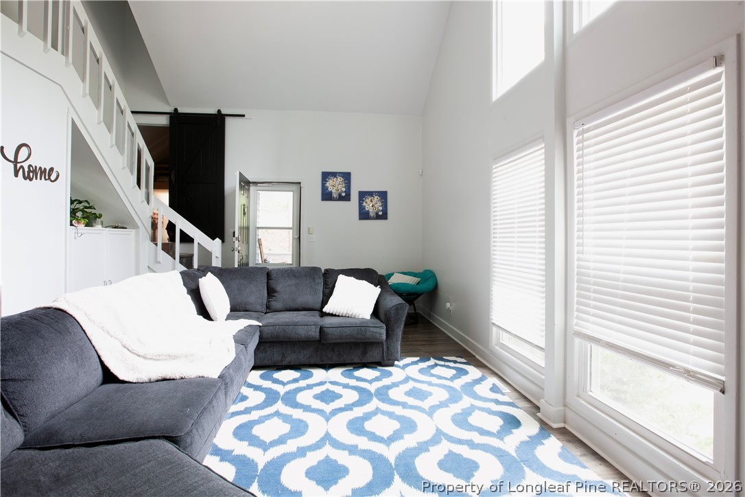 5948 Dalton Road Fayetteville, NC 28314 - Photo 11 of 18 a living room with furniture and a flat screen tv