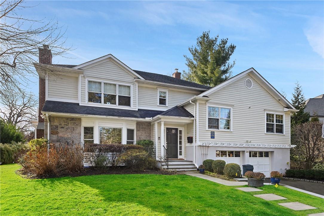 Move right into this expanded split level re-built in 2005 within very close proximity to Scarsdale Village and train.