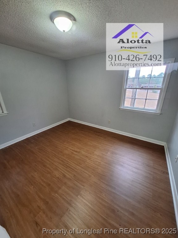 819 Ridge Road, Unit B Fayetteville, NC 28311 - Photo 2 of 7 an empty room with a window
