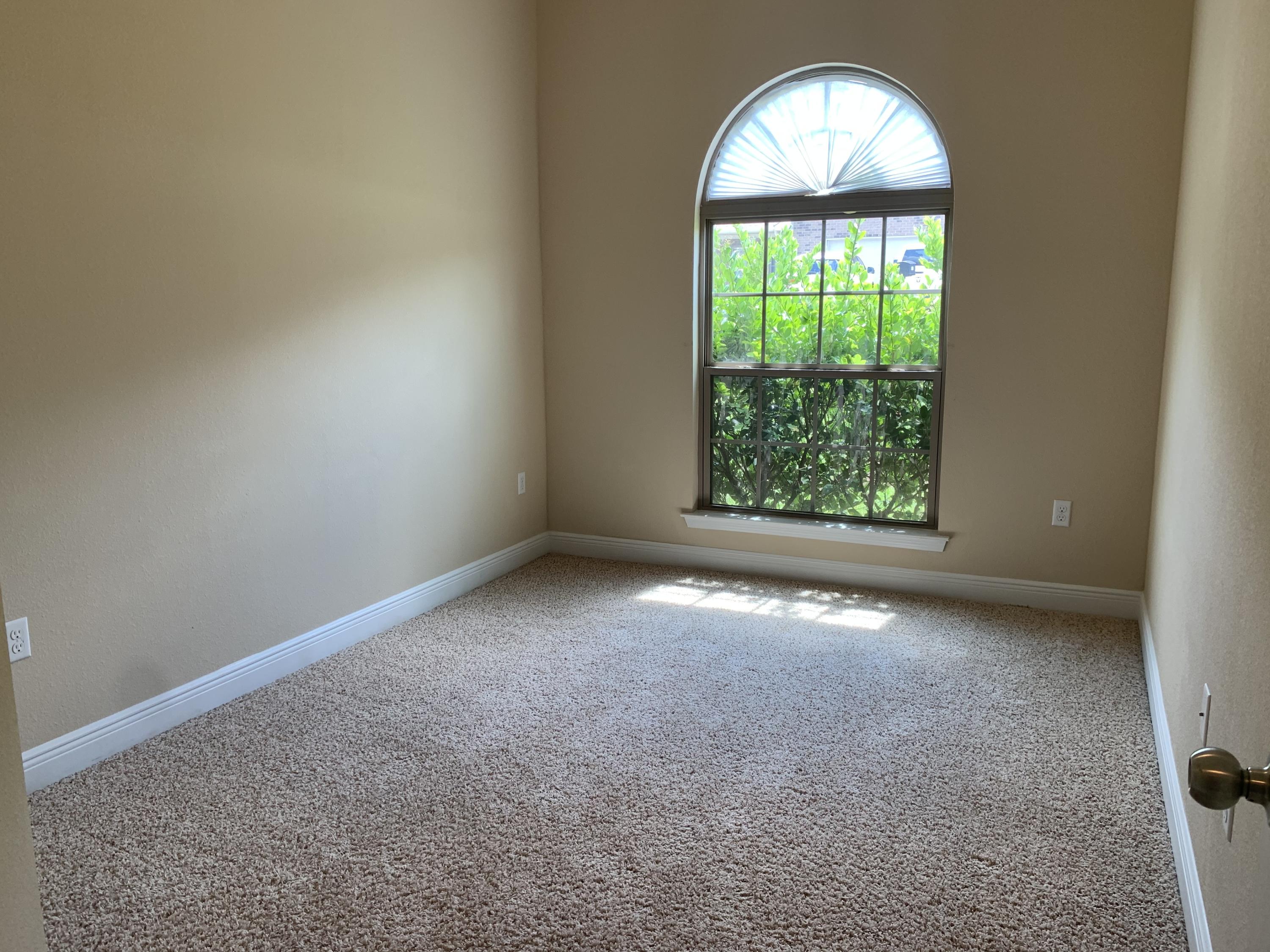 4587 Hermosa Road Crestview, FL 32539 - Photo 18 of 21 an empty room that has a window