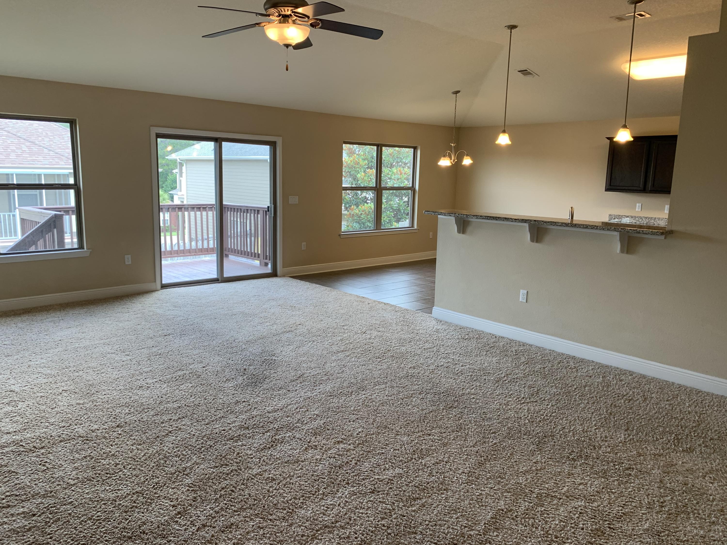 4587 Hermosa Road Crestview, FL 32539 - Photo 3 of 21 a view of an empty room with a window