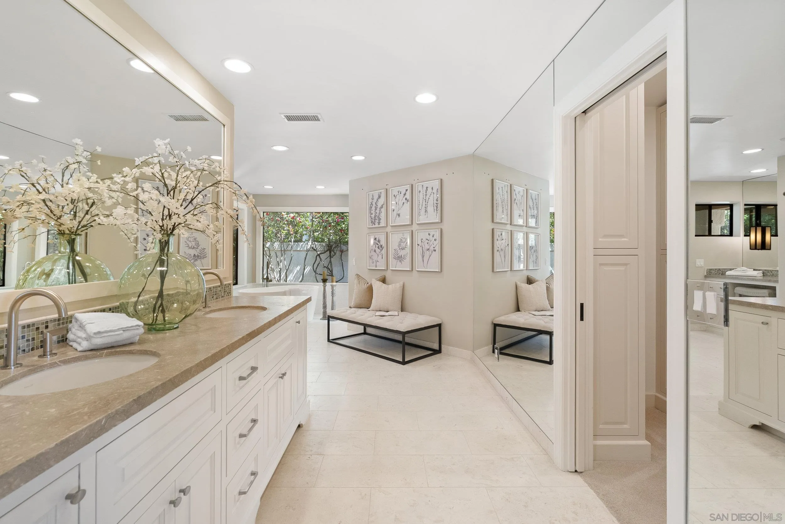17207 El Caporal Rancho Santa Fe, CA 92067 - Photo 12 of 19 a spacious bathroom with a double vanity sink mirror and