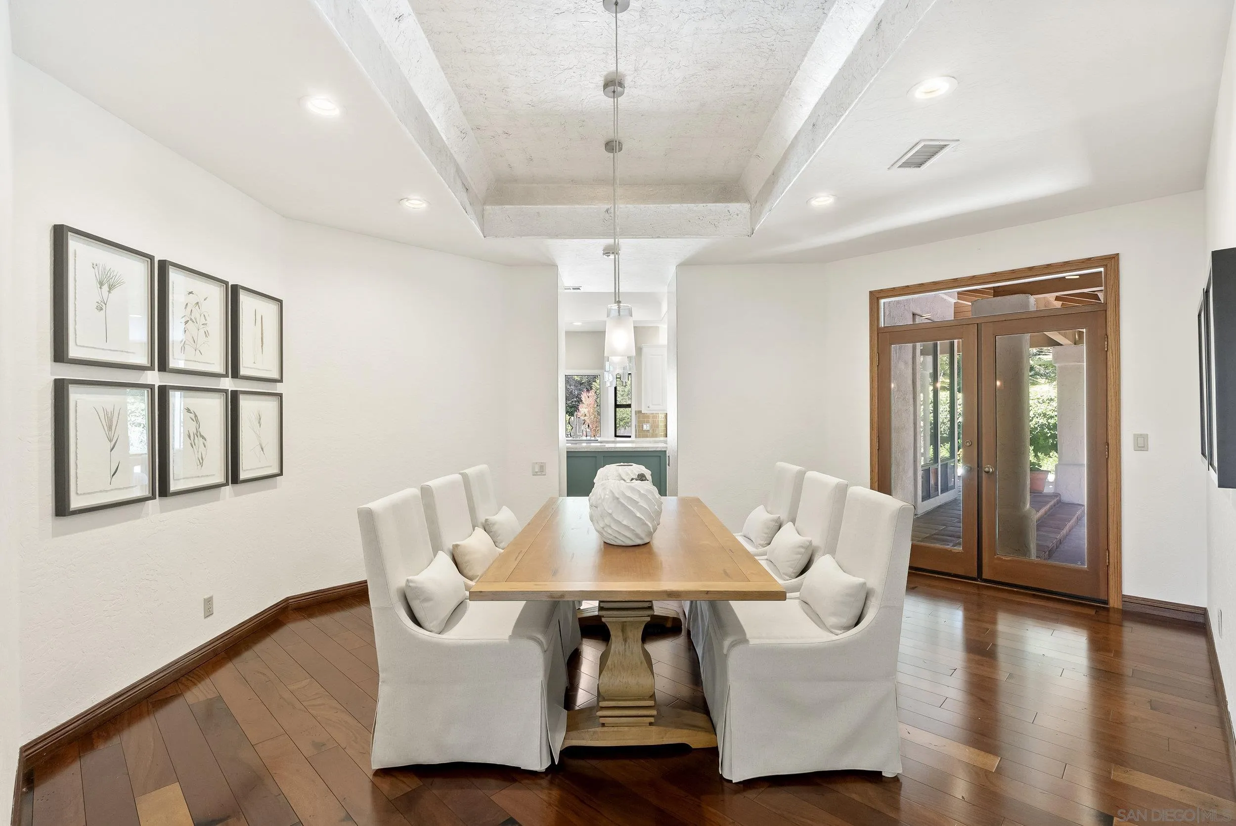 17207 El Caporal Rancho Santa Fe, CA 92067 - Photo 2 of 19 a view of a dining room with furniture window and wooden floor