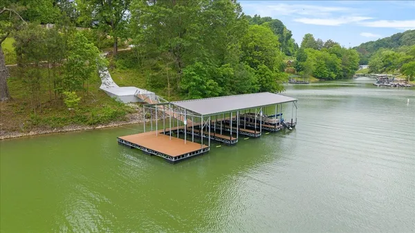 a view of a lake with houses in outdoor space