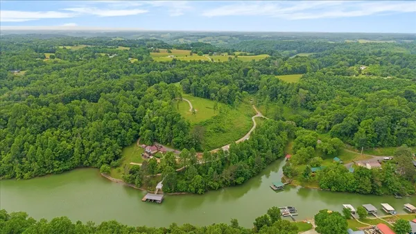 a view of a lake with a yard