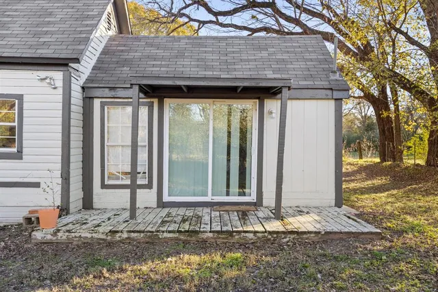 a front view of a house with a porch