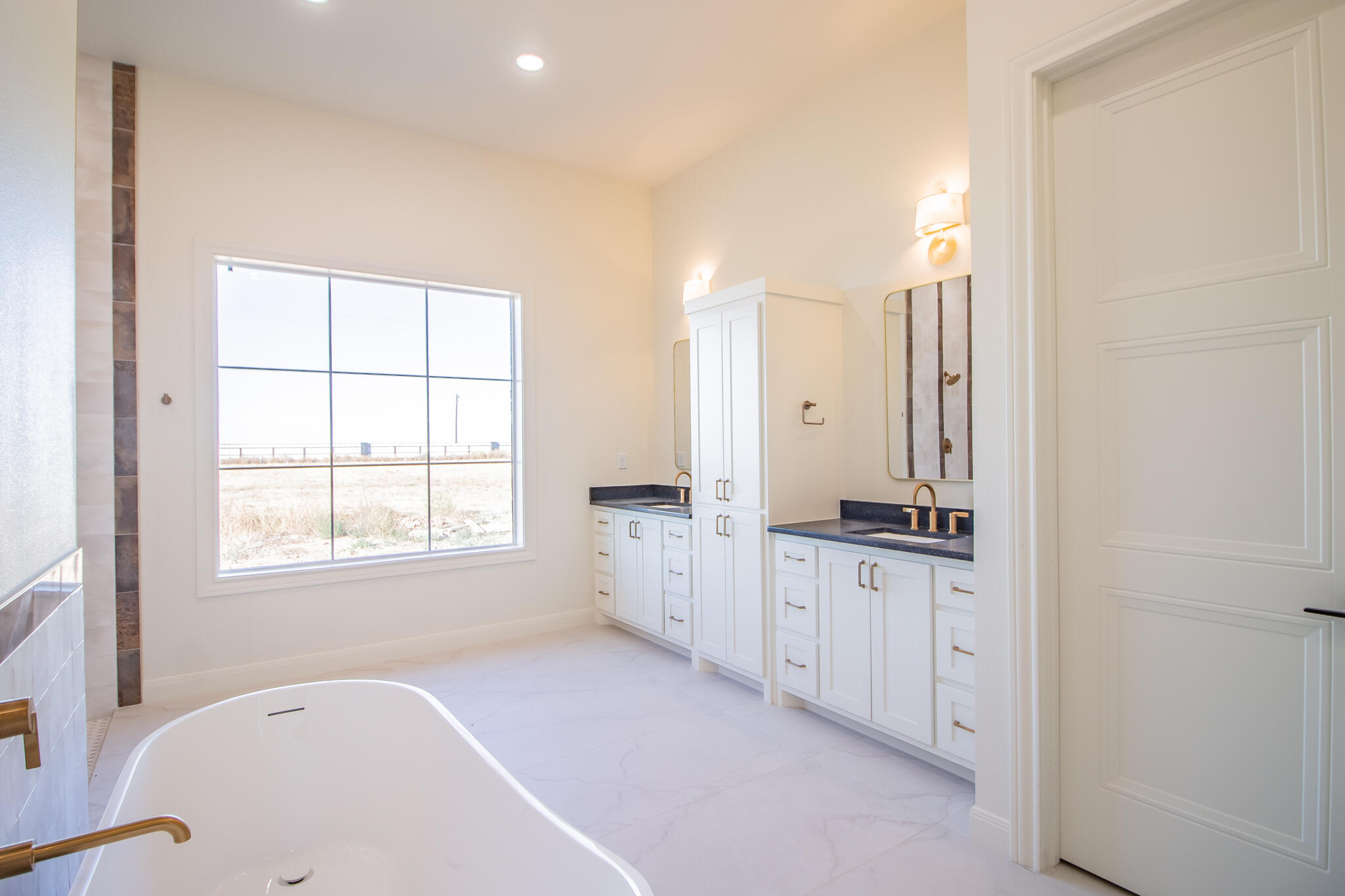 303 Juniper New Home, TX 79381 - Photo 14 of 31 an empty room with a window