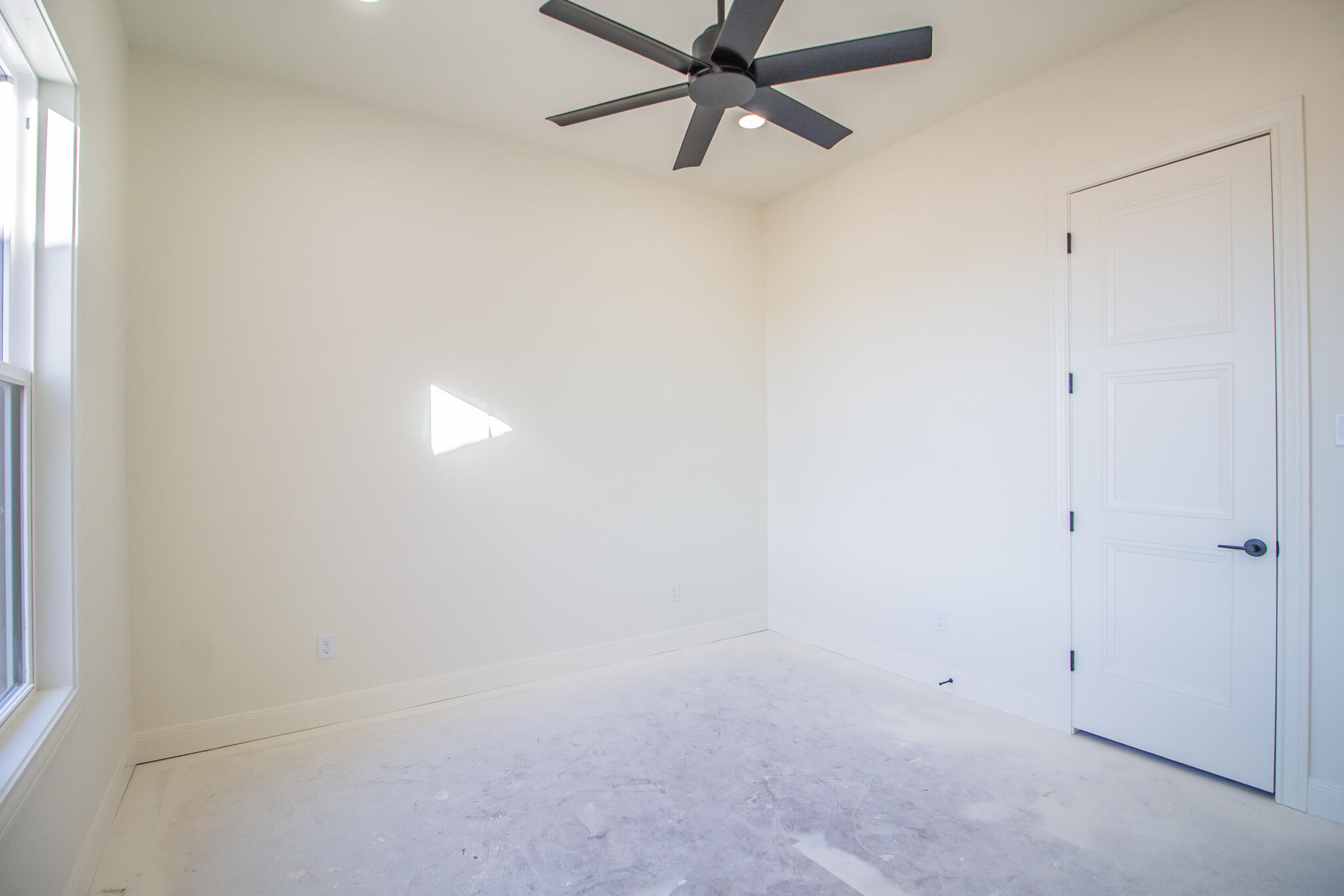 303 Juniper New Home, TX 79381 - Photo 23 of 31 a view of a room with a fan