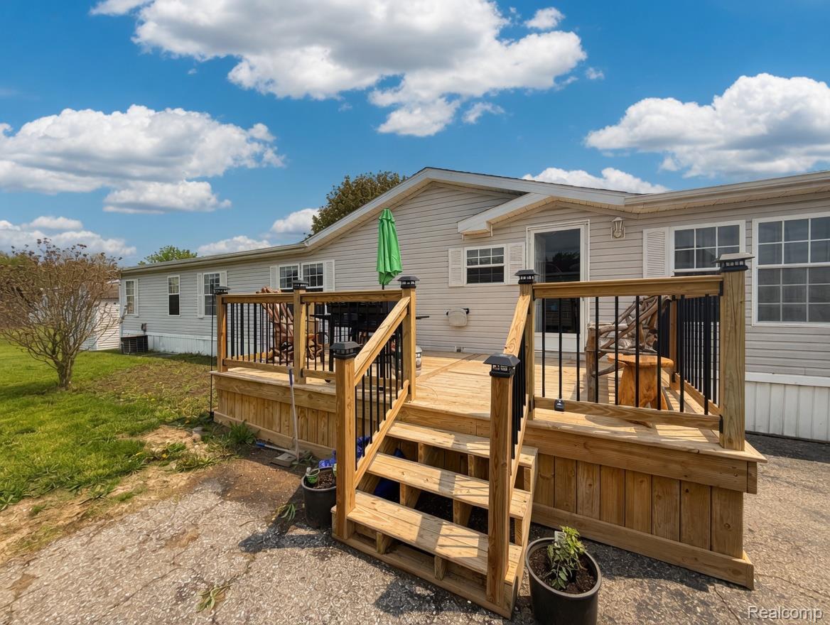 6988 McKean Road Ypsilanti, MI 48197 - Photo 1 of 31 View of wooden terrace