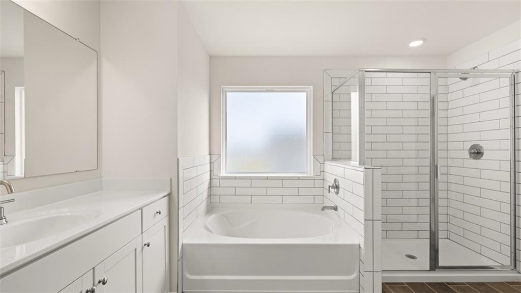 1779 Goodwin Drive Hampton, GA 30228 - Photo 26 of 49 a bathroom with a bathtub and a sink
