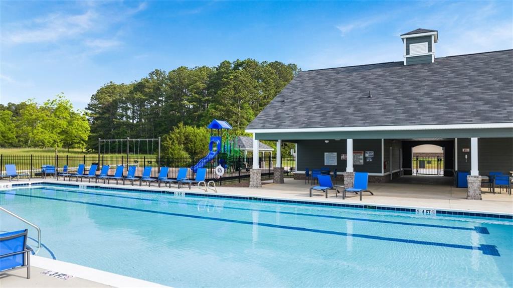 1779 Goodwin Drive Hampton, GA 30228 - Photo 34 of 49 a view of a chairs and table in a patio