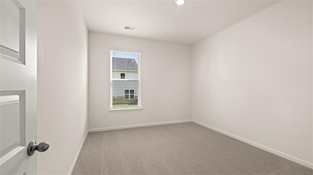 1779 Goodwin Drive Hampton, GA 30228 - Photo 40 of 49 an empty room with a window