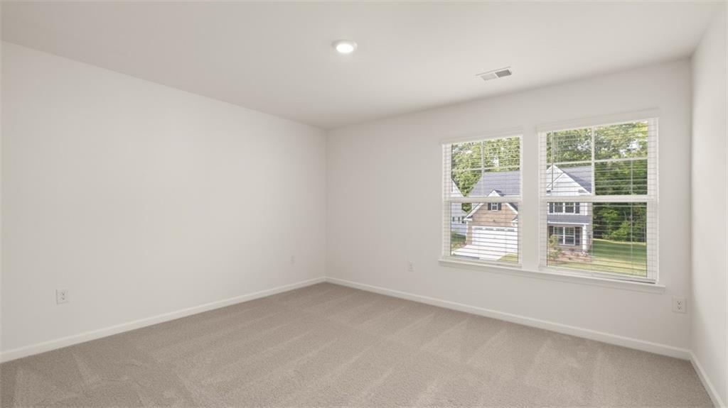 1779 Goodwin Drive Hampton, GA 30228 - Photo 47 of 49 an empty room with a window