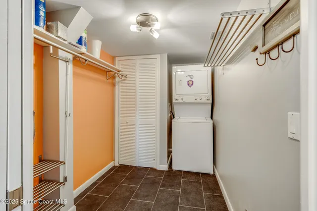 a large kitchen with a table and chairs in it