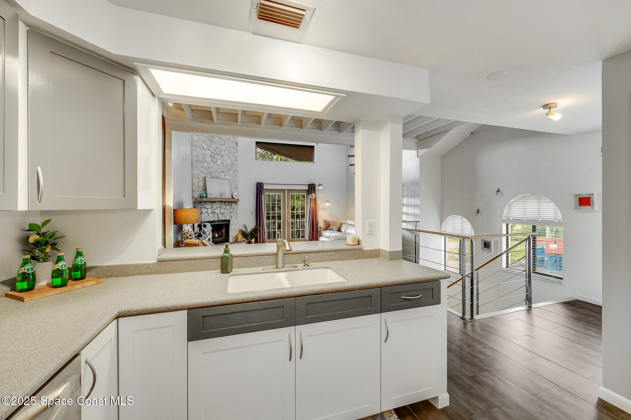 3319 Kirkland Road Northeast Palm Bay, FL 32905 - Photo 27 of 50 a spacious bathroom with a granite countertop sink and a mirror