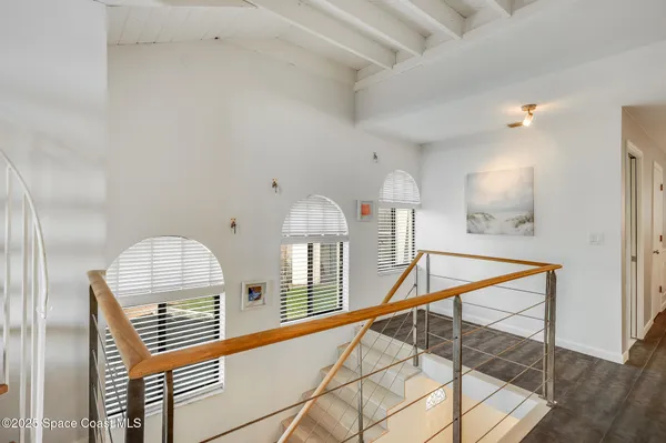 a view of a balcony with an outdoor space