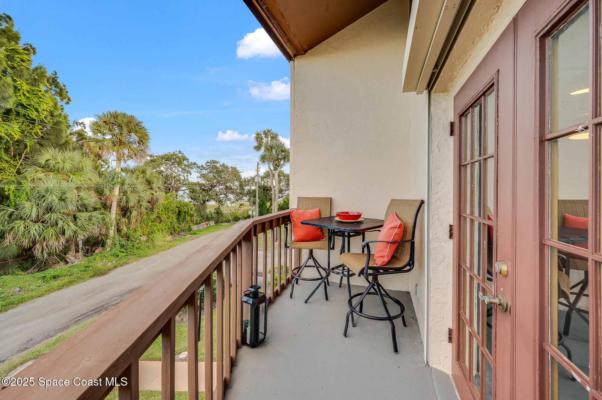 3319 Kirkland Road Northeast Palm Bay, FL 32905 - Photo 34 of 50 a view of balcony with furniture and stove