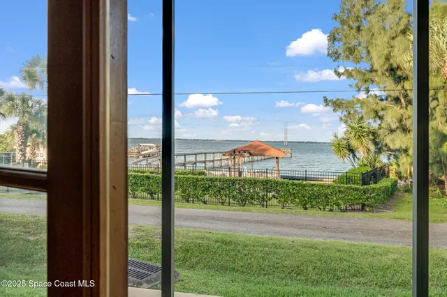 a view of a balcony with lake view