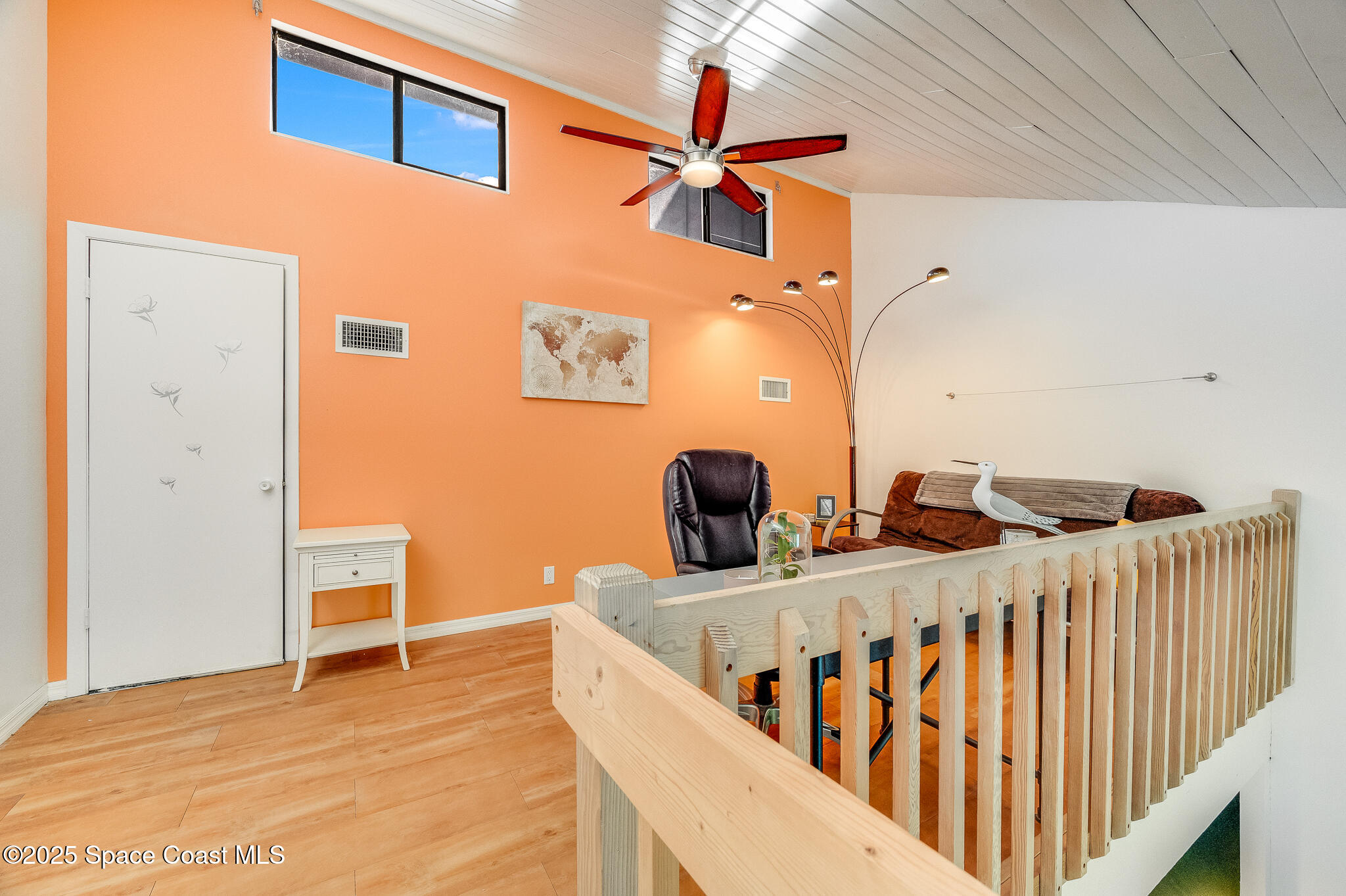 3319 Kirkland Road Northeast Palm Bay, FL 32905 - Photo 40 of 50 a view of a bedroom with two beds and wooden floor