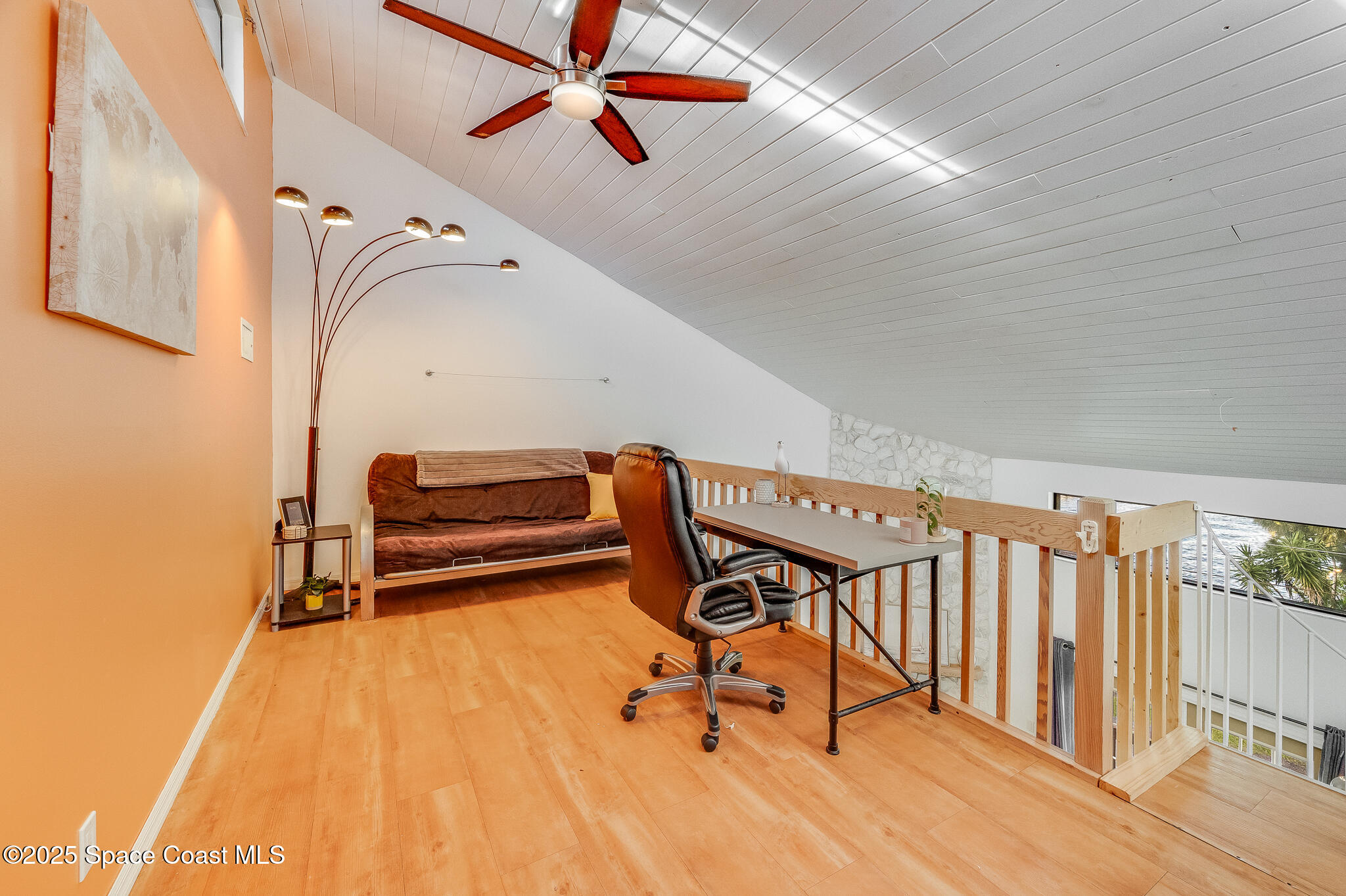 3319 Kirkland Road Northeast Palm Bay, FL 32905 - Photo 41 of 50 a view of staircase with furniture and a window