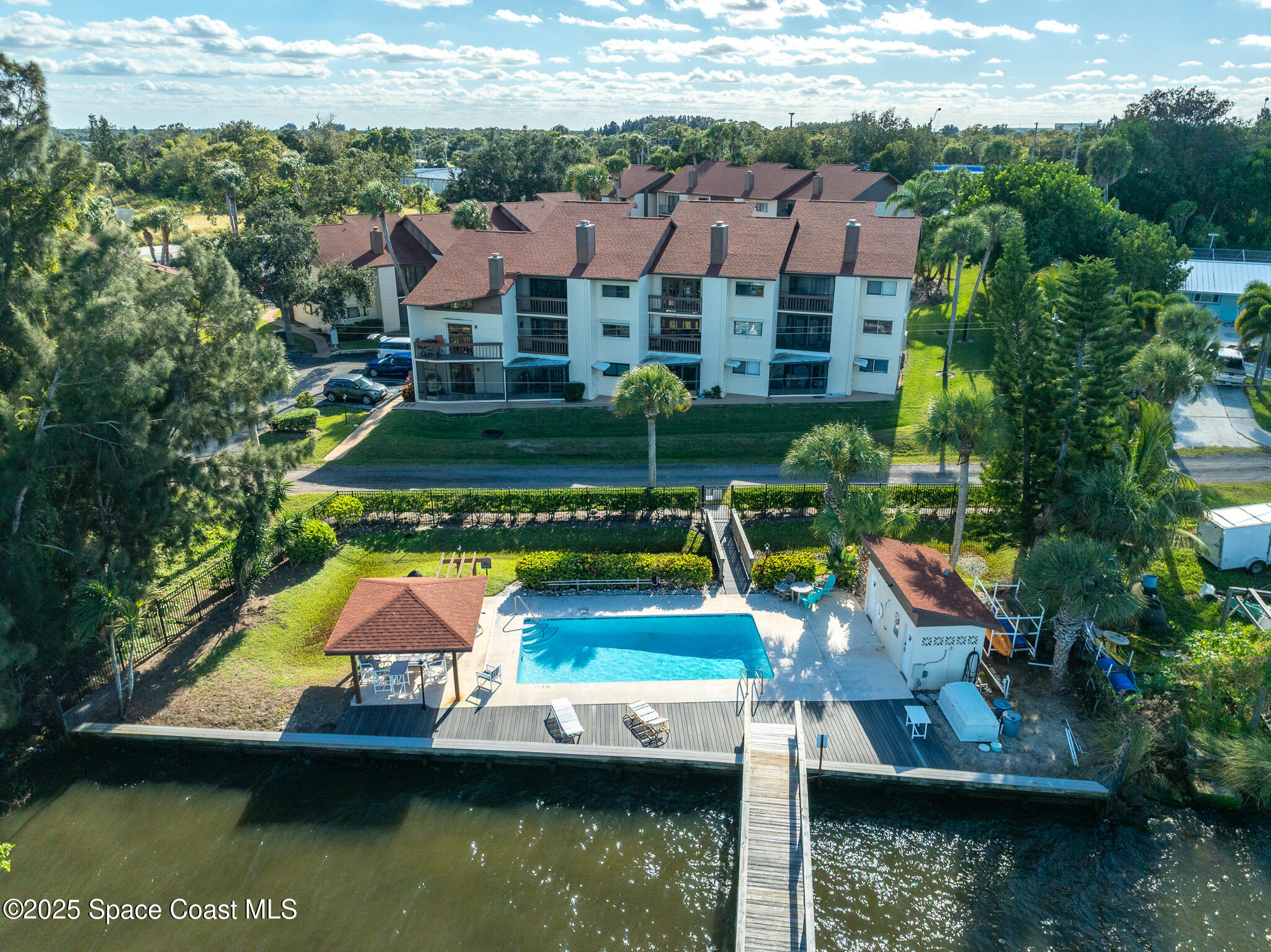 3319 Kirkland Road Northeast Palm Bay, FL 32905 - Photo 45 of 50 an aerial view of residential houses with yard