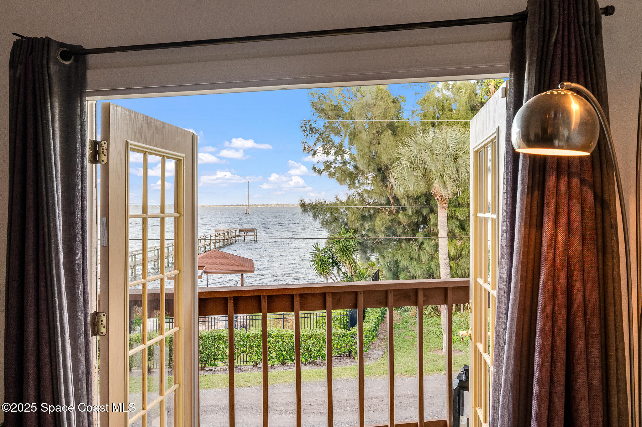 3319 Kirkland Road Northeast Palm Bay, FL 32905 - Photo 6 of 50 a view of a glass door