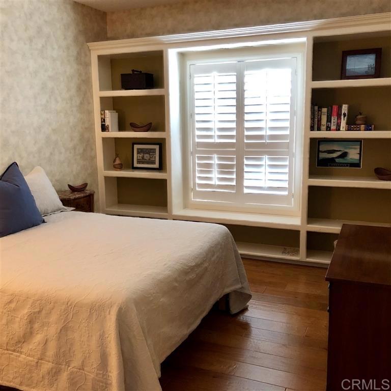 459 Lexington Circle Oceanside, CA 92057 - Photo 12 of 25 a bedroom with a bed and a window