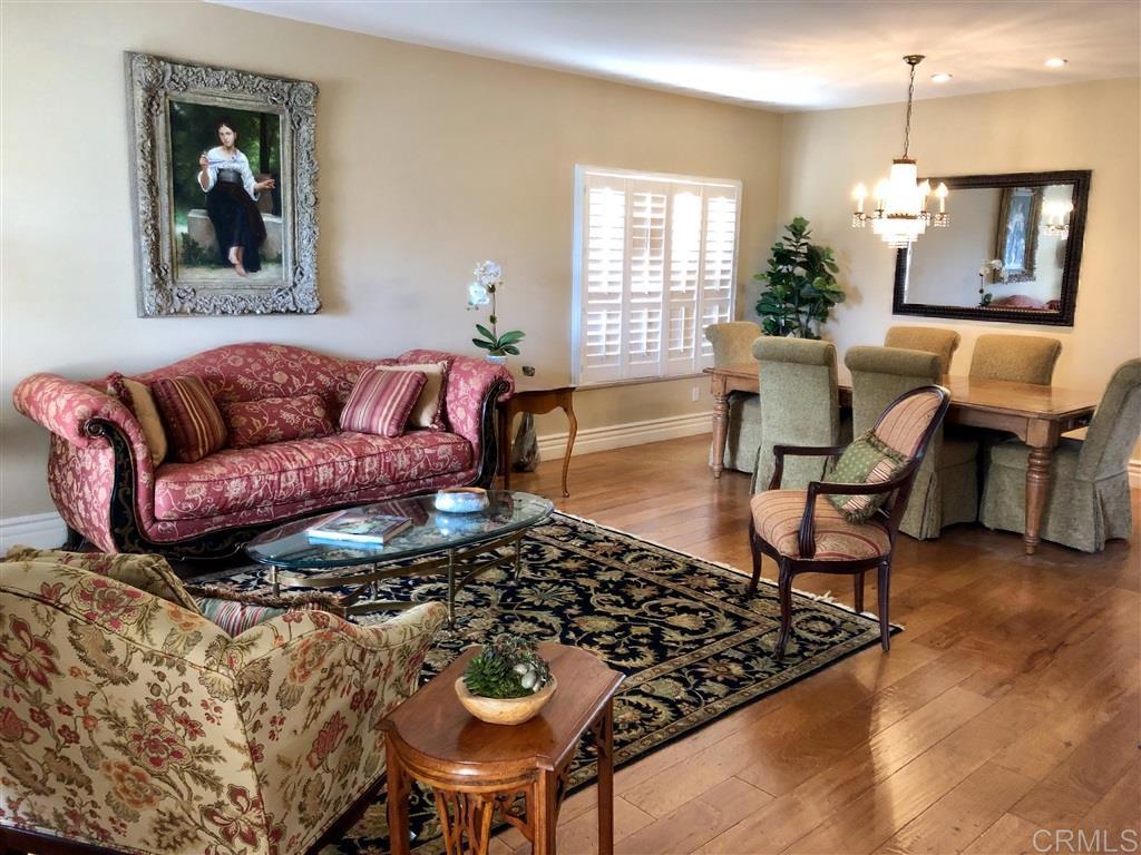 459 Lexington Circle Oceanside, CA 92057 - Photo 13 of 25 a living room with furniture and a wooden floor