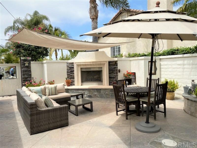 459 Lexington Circle Oceanside, CA 92057 - Photo 24 of 25 a outdoor space with furniture and umbrella