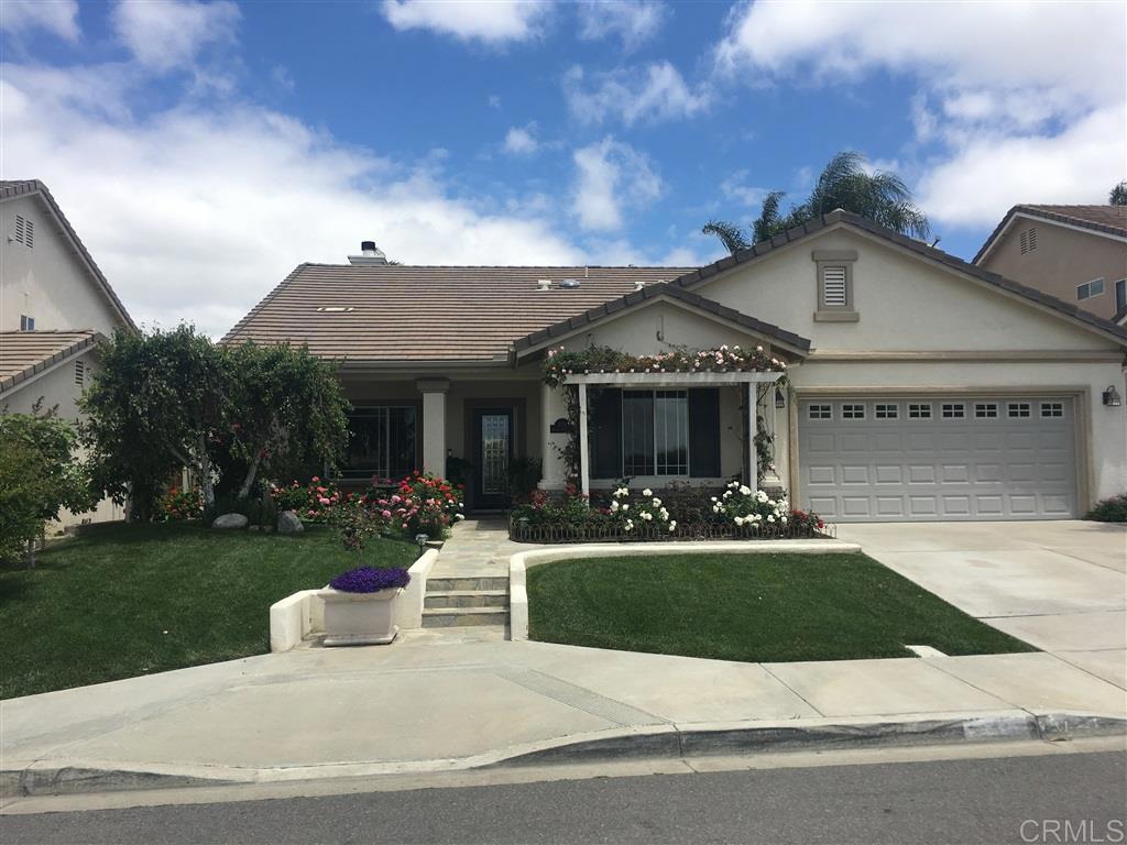 459 Lexington Circle Oceanside, CA 92057 - Photo 8 of 25 a front view of a house with entertaining space