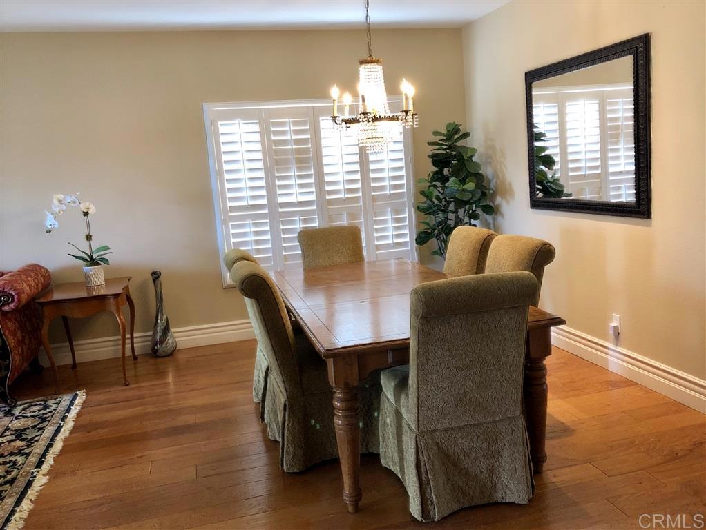 459 Lexington Circle Oceanside, CA 92057 - Photo 10 of 25 a dining room with furniture and window