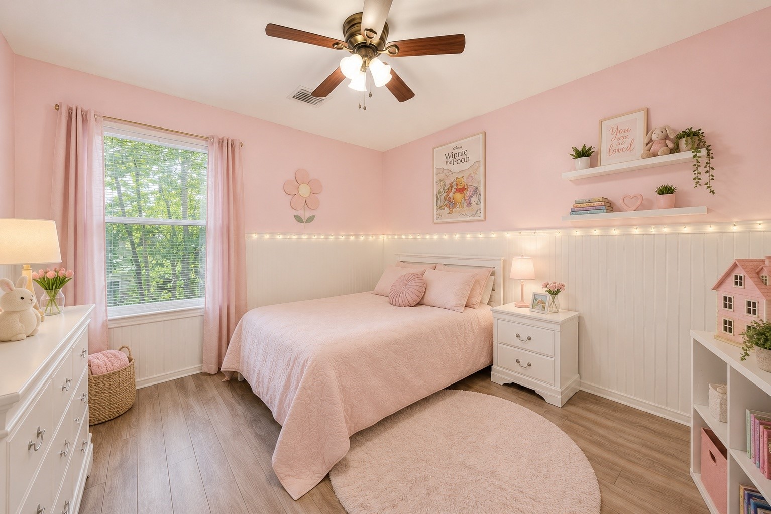 38 Musgrove Place Spring, TX 77382 - Photo 21 of 36 Charming bedroom with wainscoting, wide-plank floors, and a ceiling fan for year-round comfort.