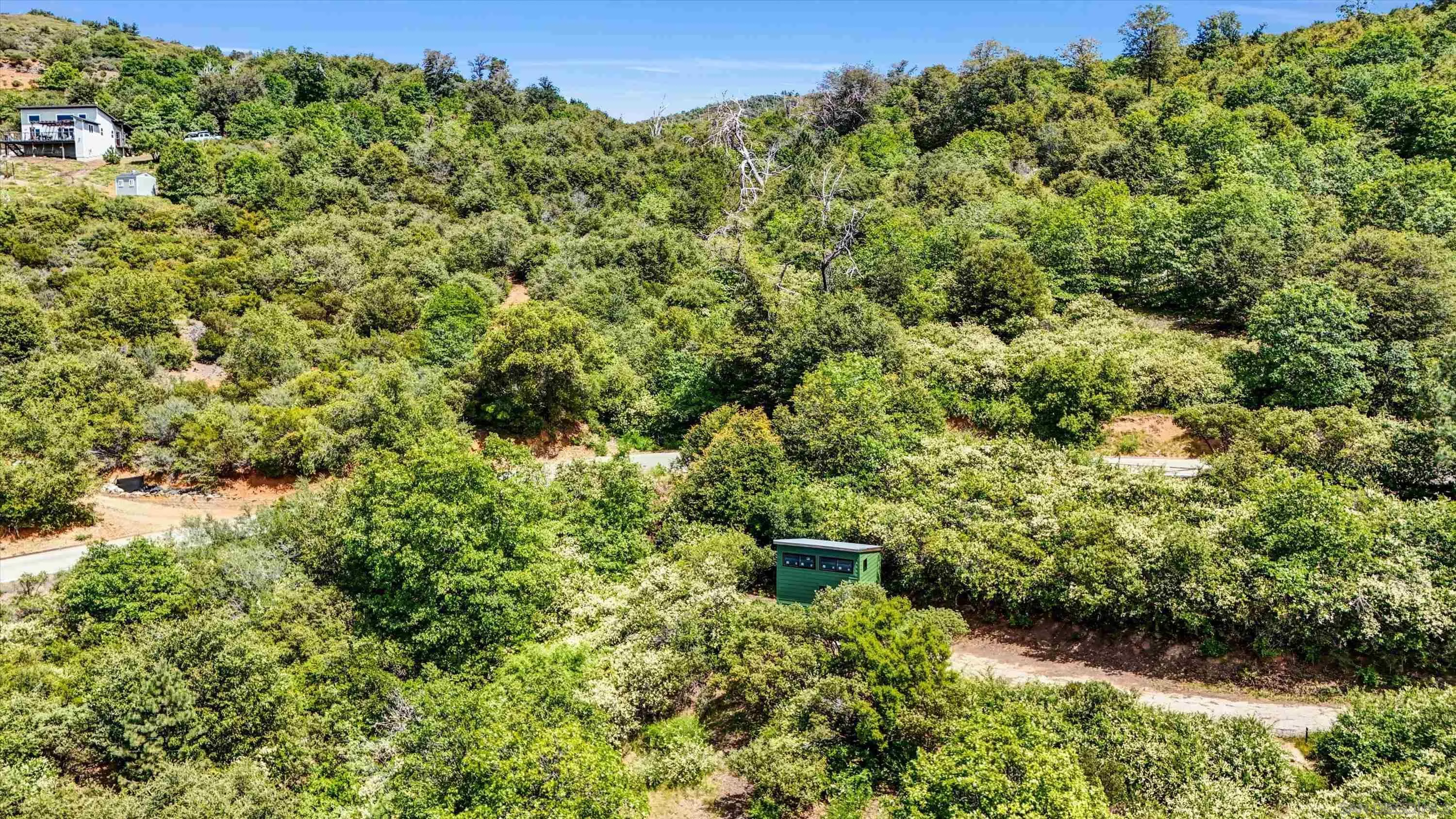 7632 Engineers Road, Unit 21 Julian, CA 92036 - Photo 7 of 20 an aerial view of a house with a yard