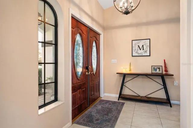 a view of an entryway with furniture and front door