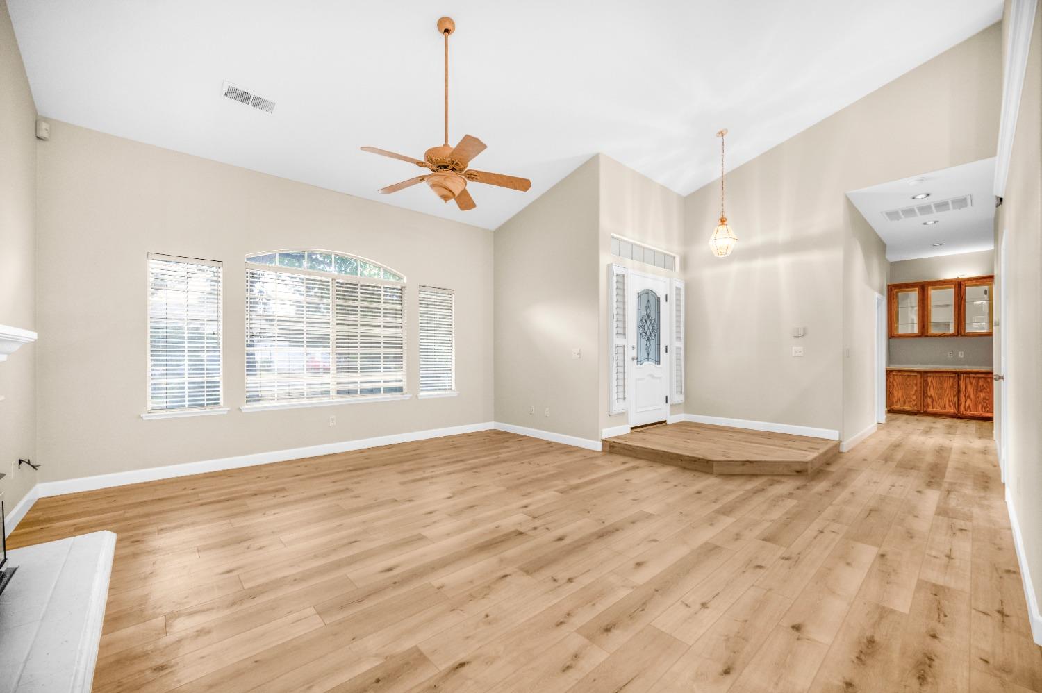 733 Applegate Avenue Clovis, CA 93611 - Photo 5 of 25 a view of an empty room with a window