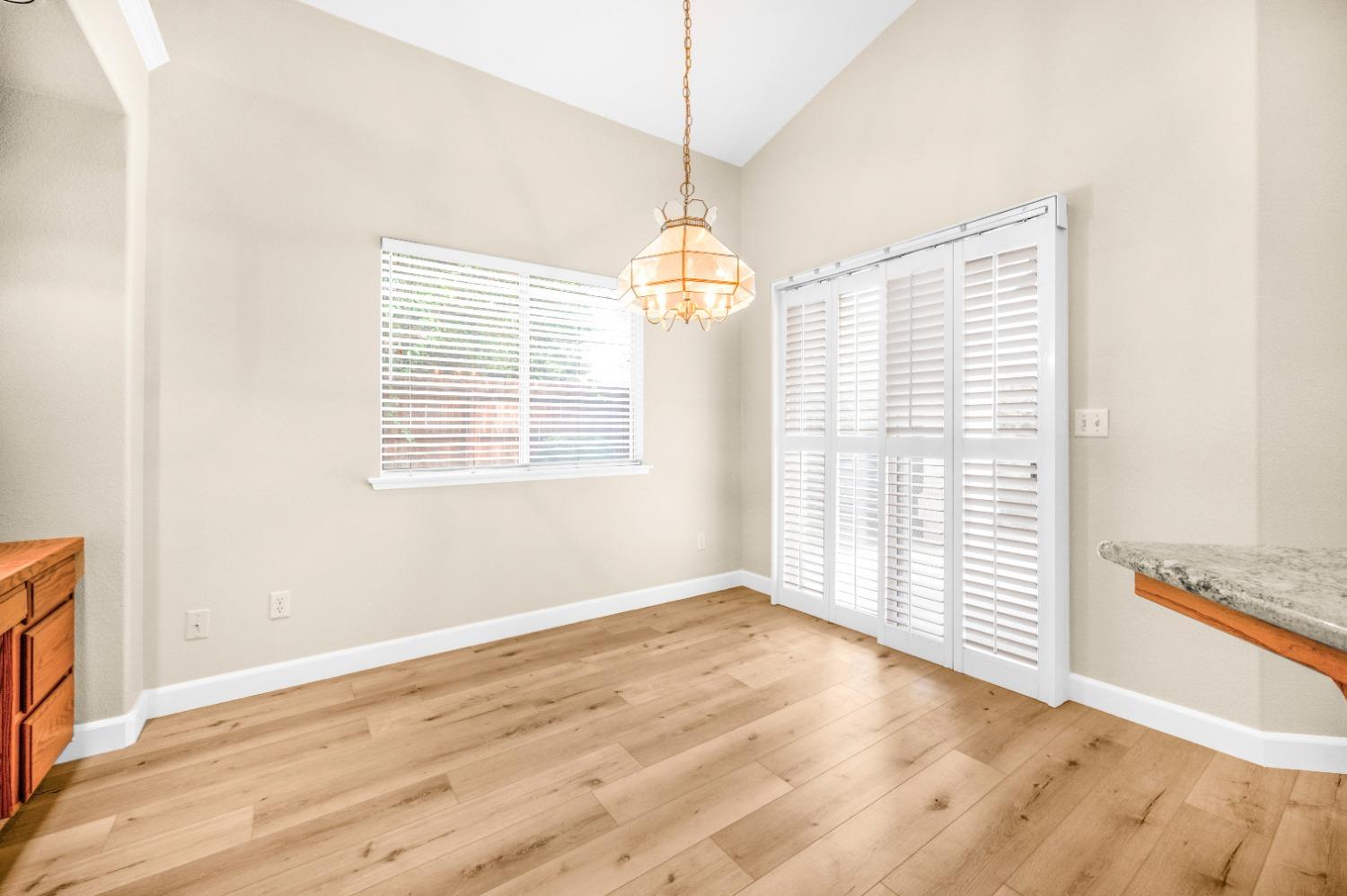 733 Applegate Avenue Clovis, CA 93611 - Photo 9 of 25 a view of an empty room with a window