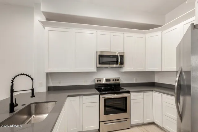 an empty room with a empty space and a window