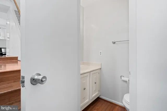 a bedroom with furniture and a flat screen tv