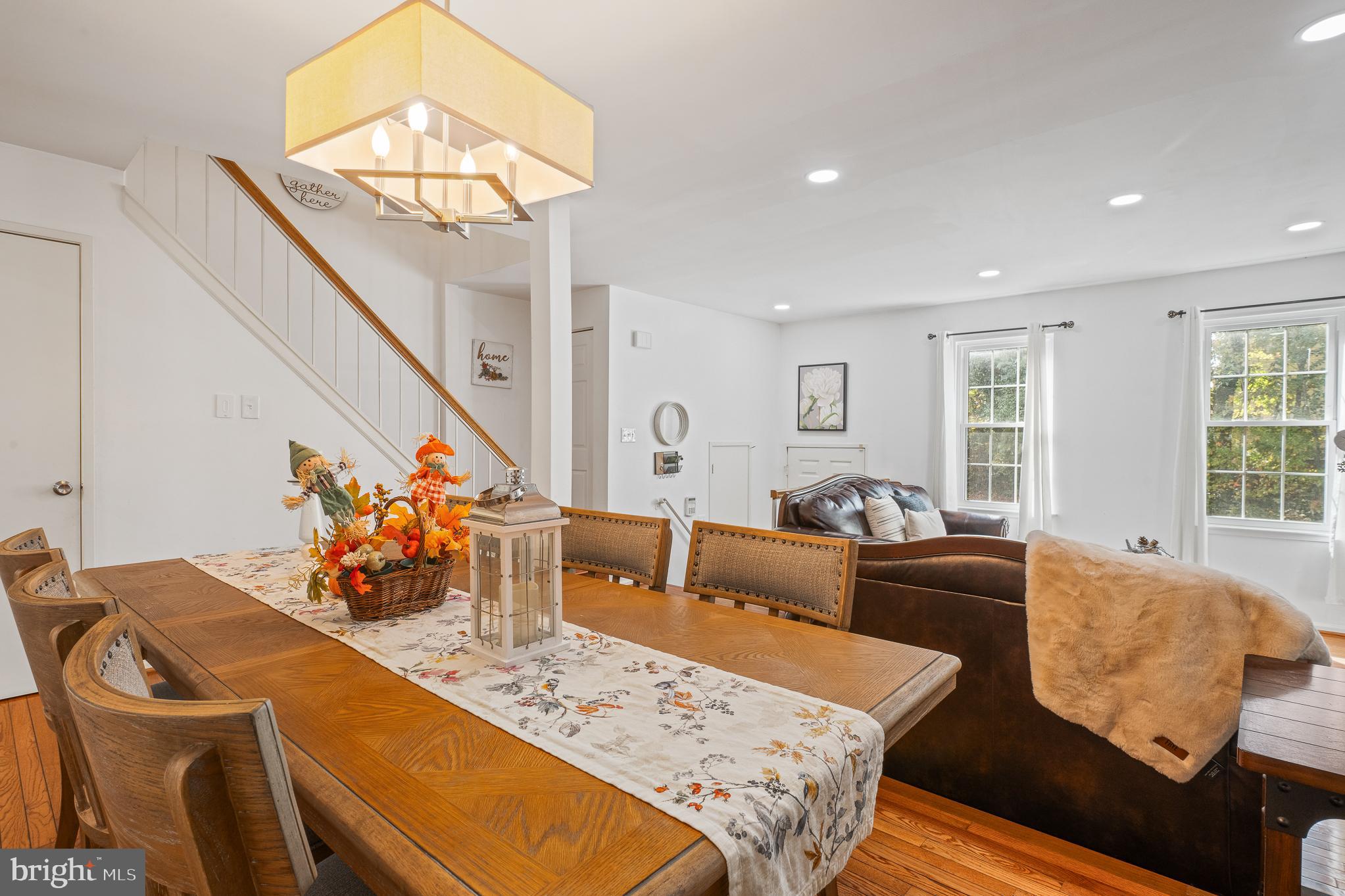 13007 Climbing Ivy Drive Germantown, MD 20874 - Photo 24 of 63 a living room with furniture and a large window