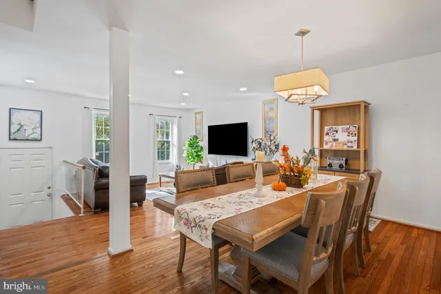 a kitchen with granite countertop stainless steel appliances and refrigerator