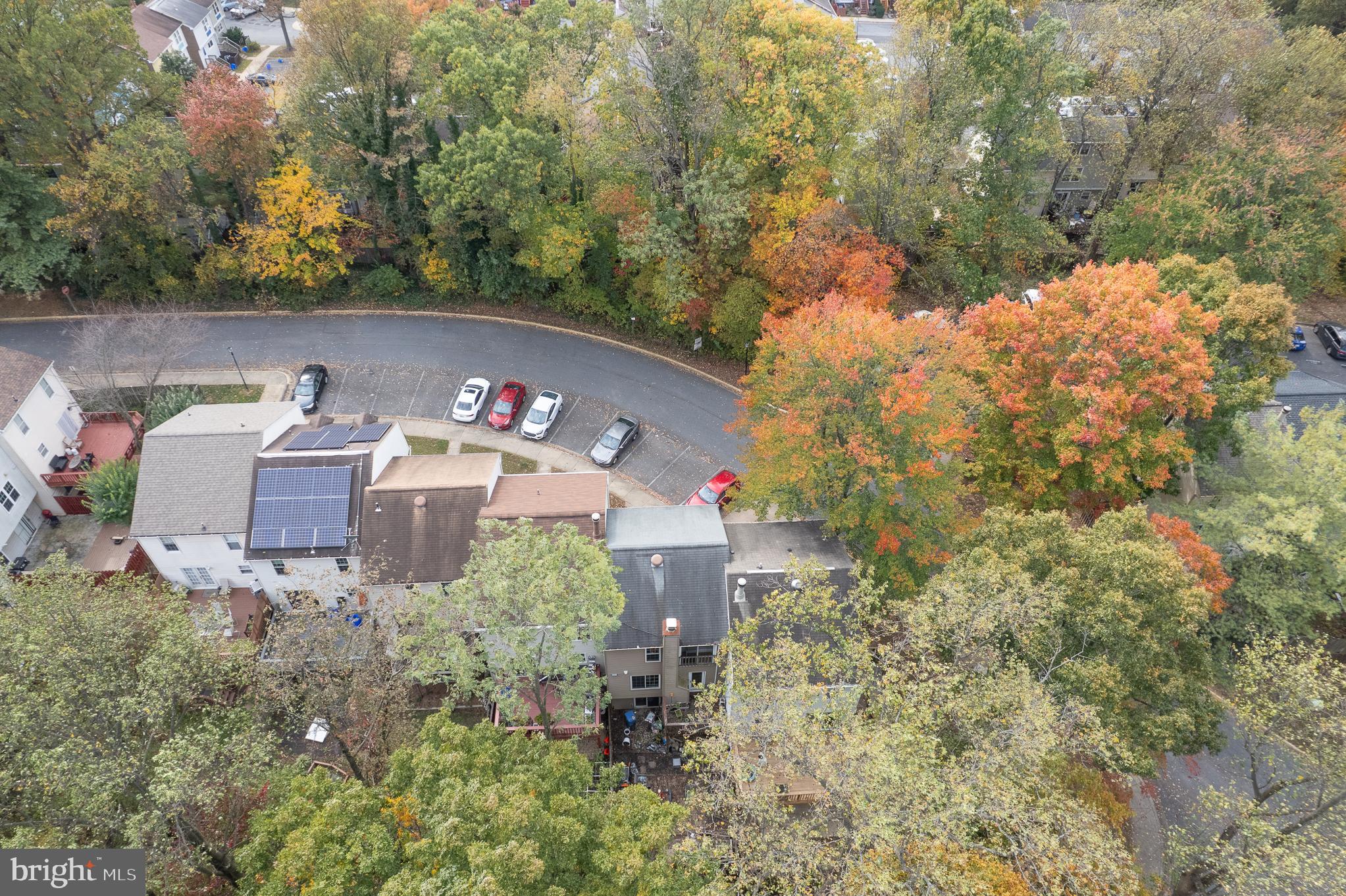 13007 Climbing Ivy Drive Germantown, MD 20874 - Photo 5 of 63 an aerial view of a house with yard and outdoor seating