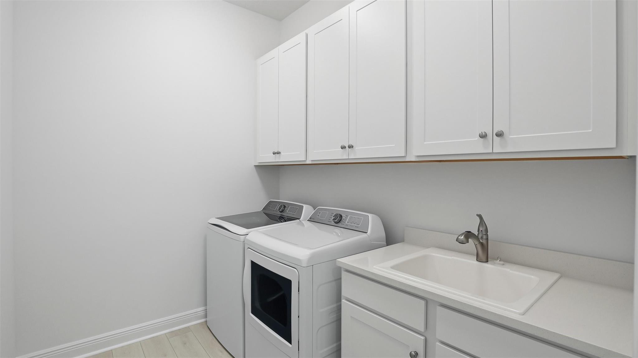 4943 Rivo Alto Circle Loxahatchee, FL 33470 - Photo 27 of 57 Laundry