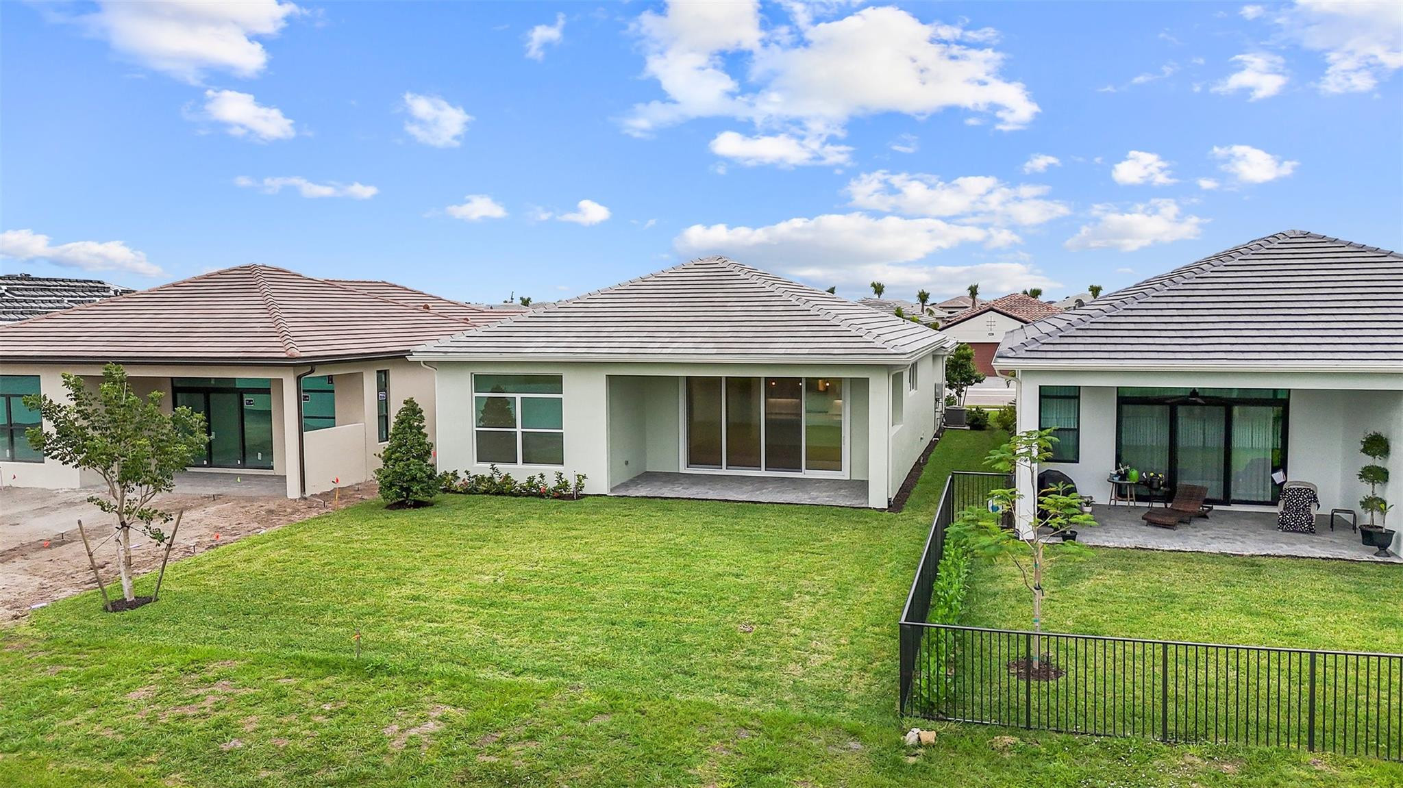 4943 Rivo Alto Circle Loxahatchee, FL 33470 - Photo 36 of 57 Rear Exterior