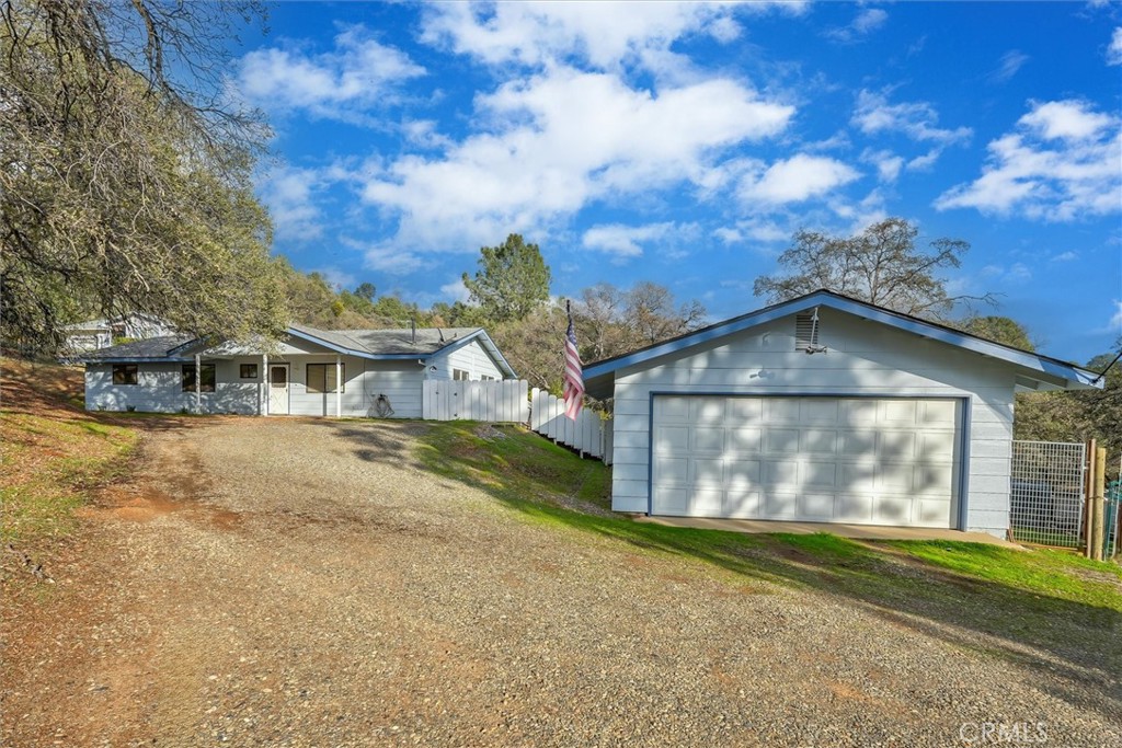 a front view of house with garden