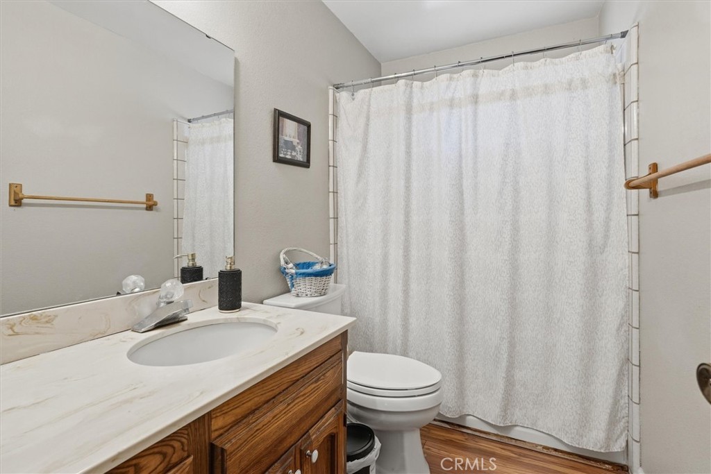 5060-5064 Mykleoaks Road Mariposa, CA 95338 - Photo 17 of 63 a bathroom with a sink and a toilet