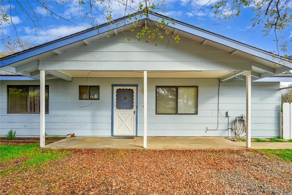 5060-5064 Mykleoaks Road Mariposa, CA 95338 - Photo 2 of 63 a view of a house with a backyard