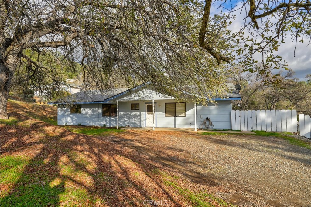 5060-5064 Mykleoaks Road Mariposa, CA 95338 - Photo 2 of 63 a front view of a house with a yard