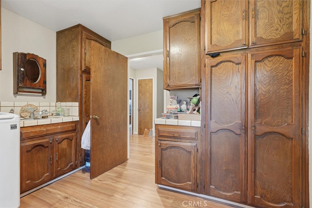 5060-5064 Mykleoaks Road Mariposa, CA 95338 - Photo 24 of 63 a bathroom with a sink a mirror and a shower